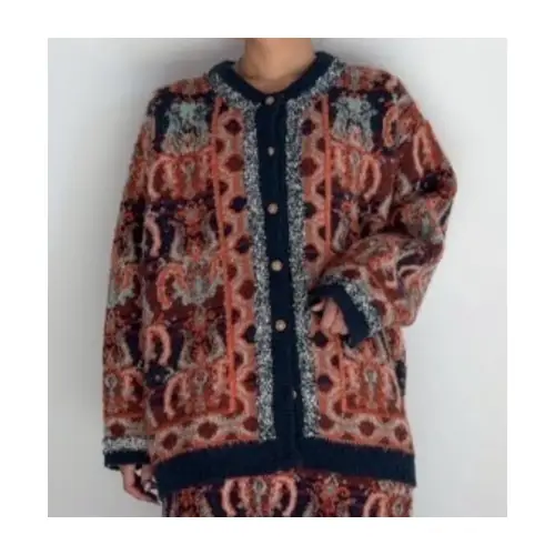 永瀬廉が着用しているUnitageのカーディガン