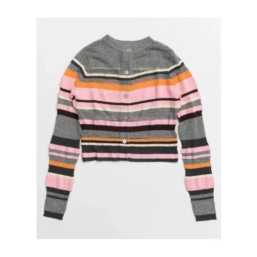 本田望結が着用しているMAISON SPECIALのカーディガン