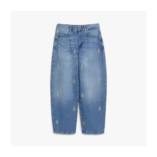 ジスが着用しているTommy Hilfigerのパンツ（ロング）