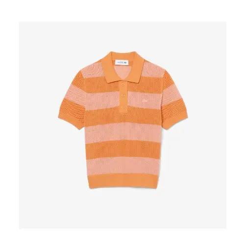 鎮西寿々歌が着用しているLacosteのニット