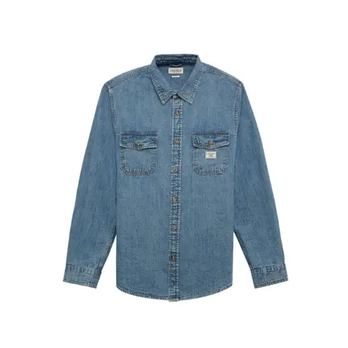 ヒョンジンが着用しているGUESS JEANSのシャツ・ブラウス